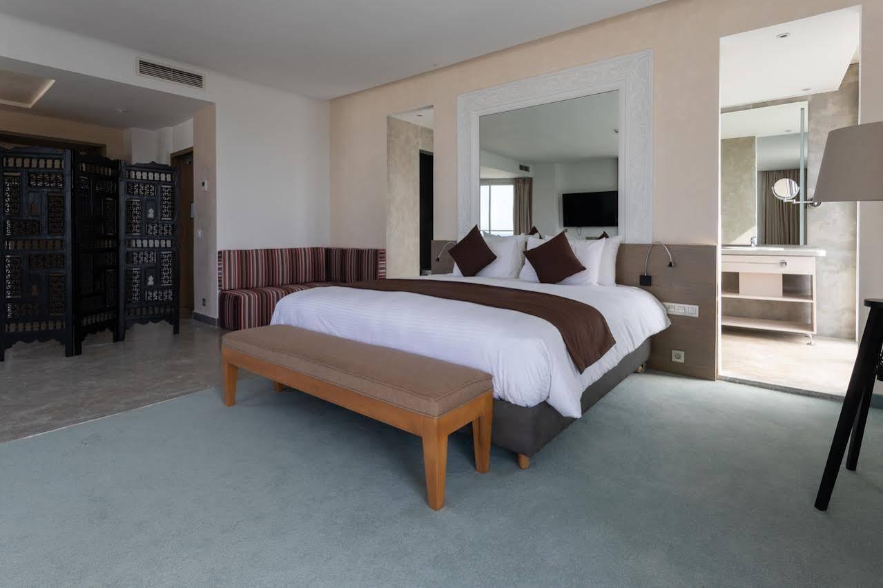 Mandarin Palace Hotel&Spa Tangier Bagian luar foto A bedroom at the hotel