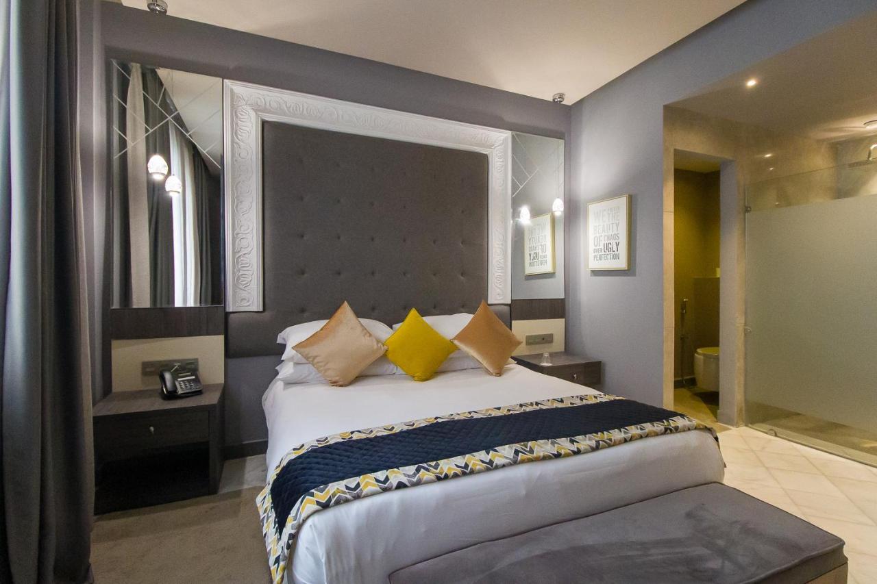 Mandarin Palace Hotel&Spa Tangier Bagian luar foto A bedroom at the hotel